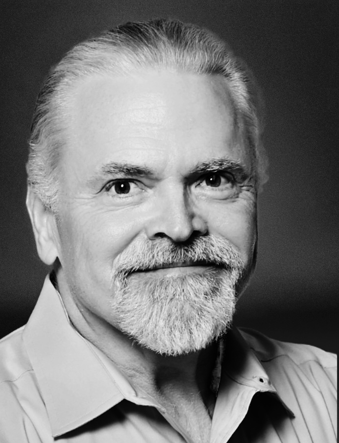 Black-and-white headshot of playwright William A. Smith